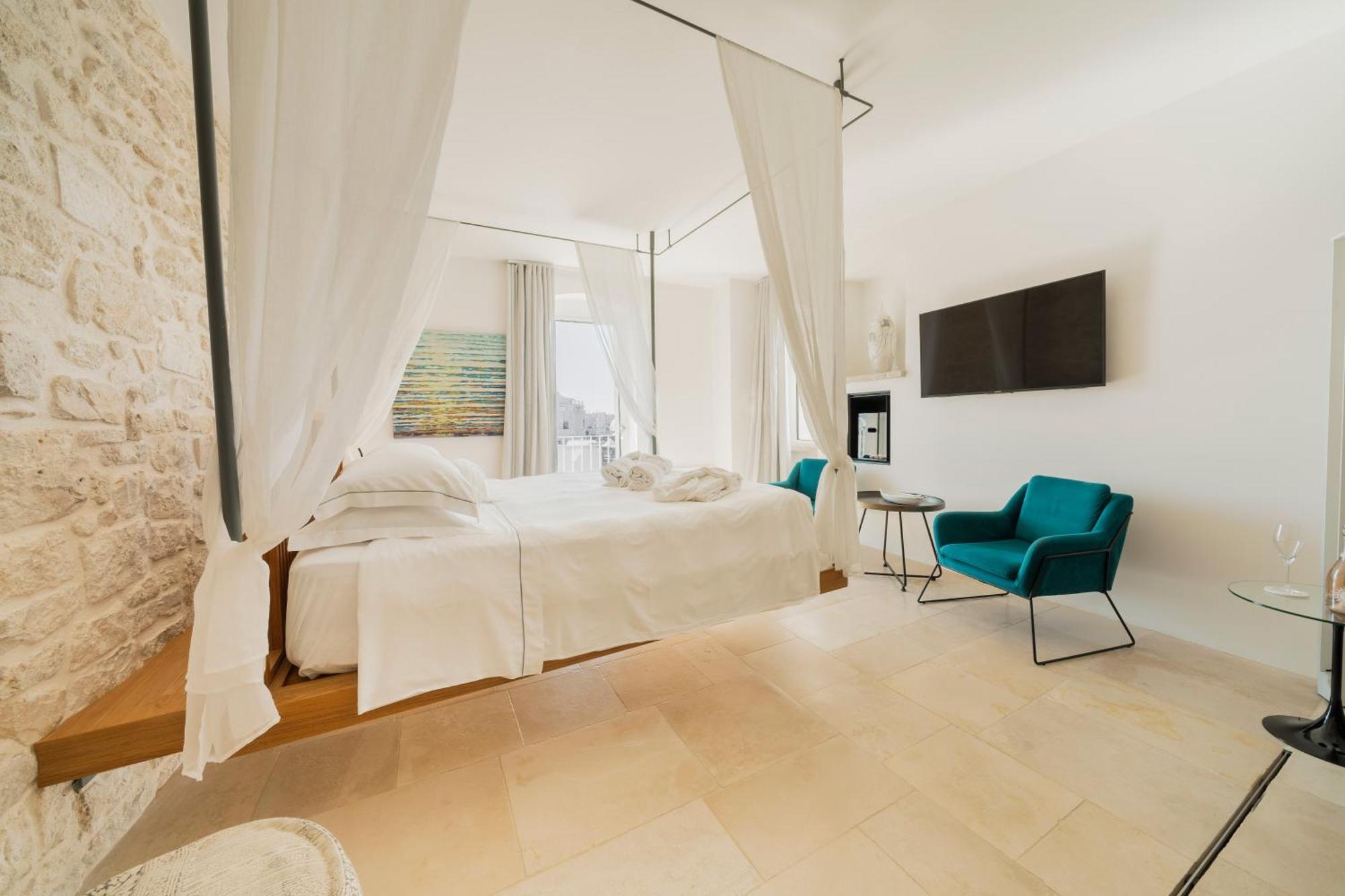 Suite mit Queensize-Doppelbett und Meerblick